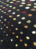 Hand-Knotted Black Wool Rug with Vibrant Accents 4' 02" x 6' 09" | Woven Wonders