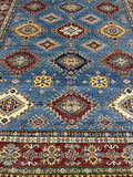 Elegant Hand-Knotted Blue Wool Rug 8' 09" x 11' 11" | Woven Wonders