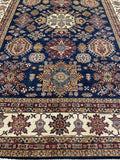 Green, Red, and Ivory Accents Dark Blue Wool Rug  8' 10" x 11' 11" | Woven Wonders